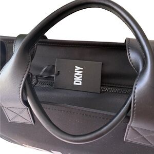 DKNY crossbody bag. Nylon with faux leather trimming. New with tags.